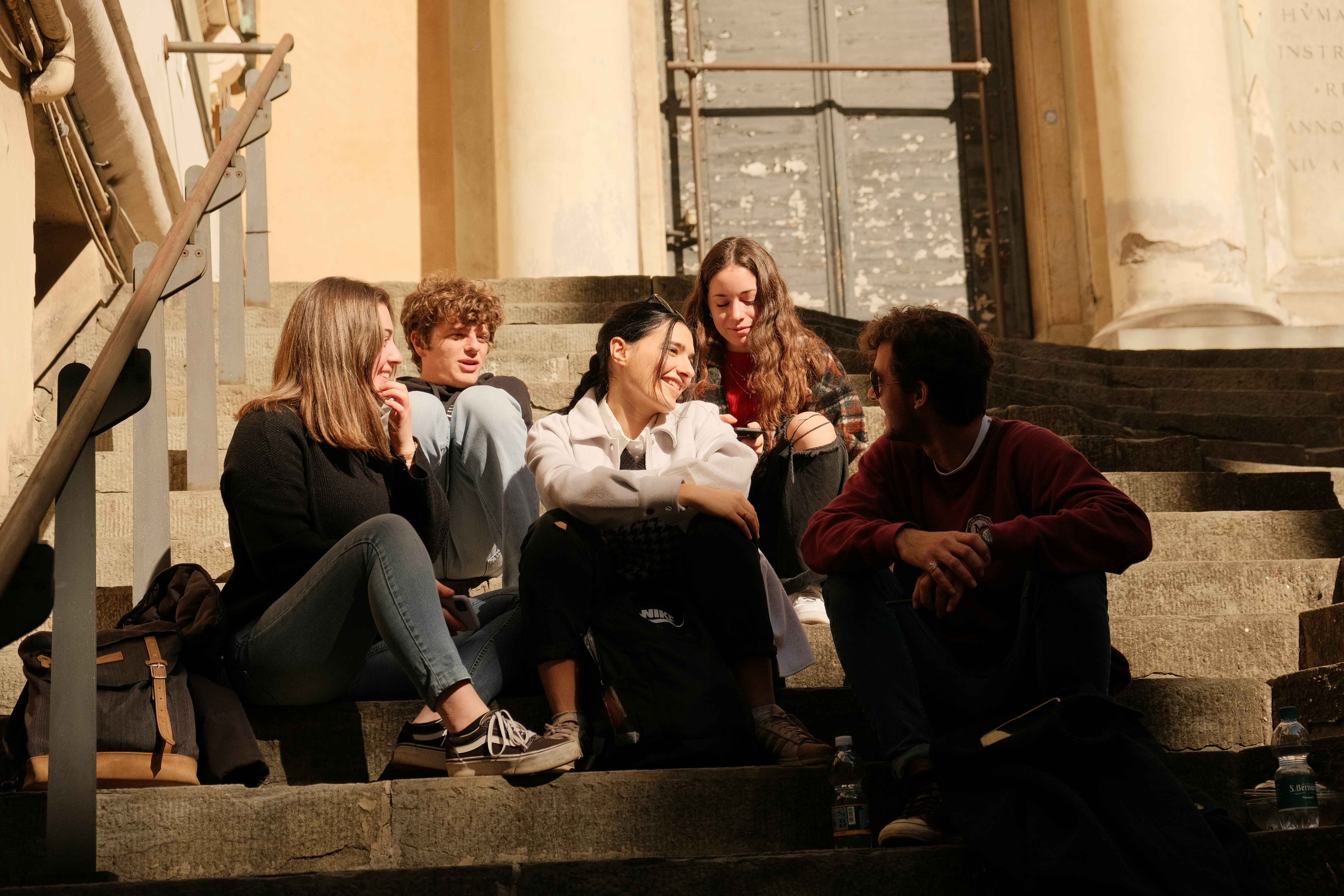 Students talk on steps