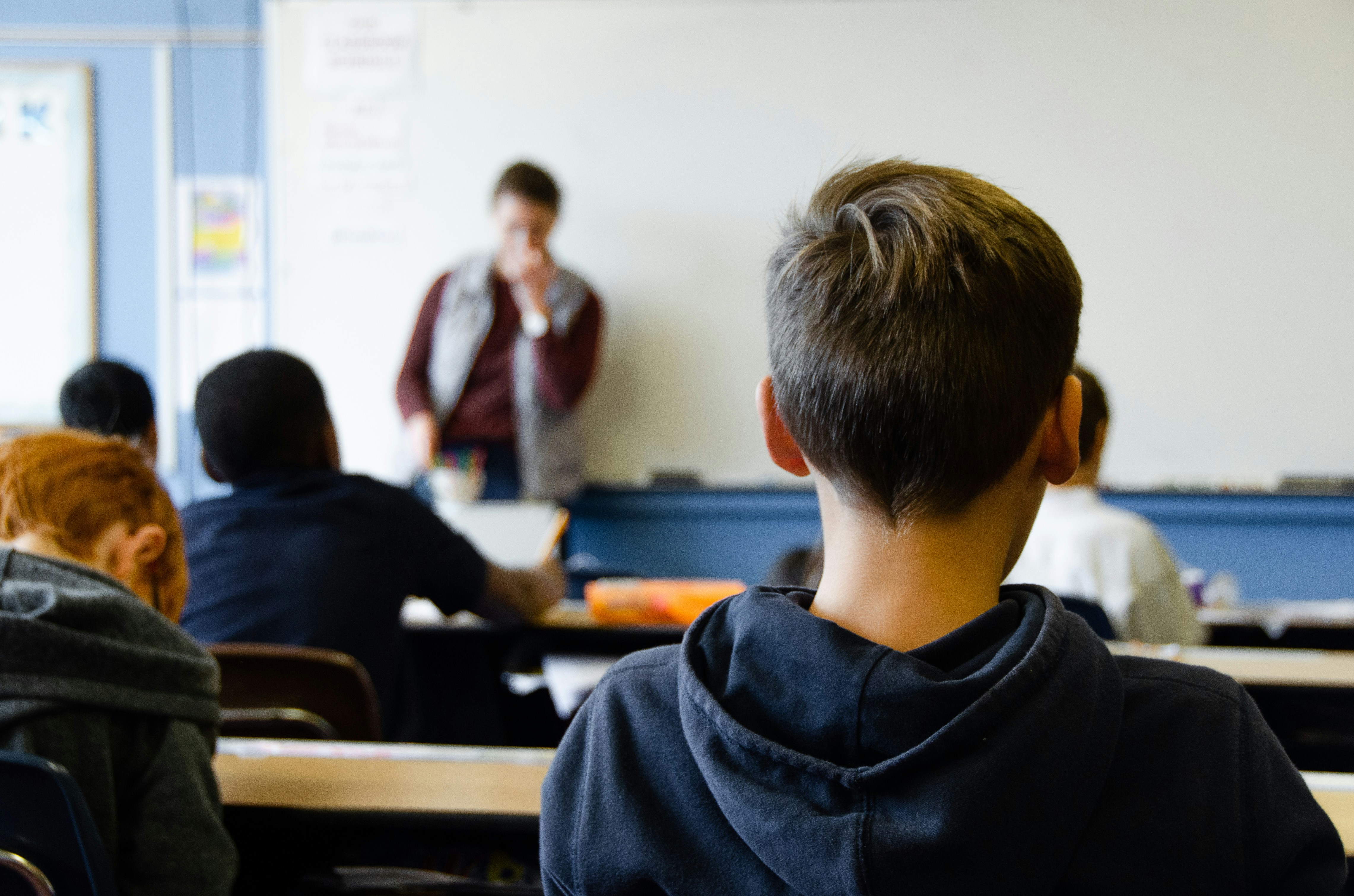 Student sits at the back of class